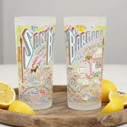 Two colorful tumblers with illustrations and text on a white background