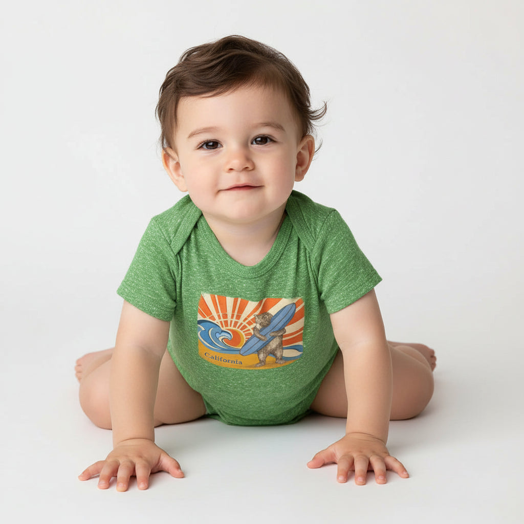 Green baby onesie with a bear holding a surfboard and sun design, labeled 'California'.