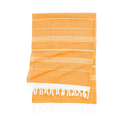 Soft textured terry cloth beach towel drying in the sun