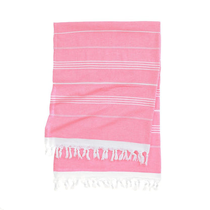 Plush terry-backed Turkish towel draped over a pool cha