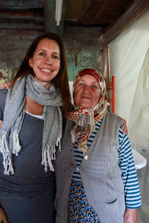 With one of the weavers in her village workshop