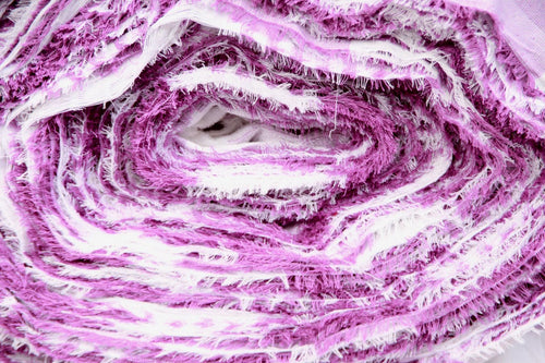Rolled pink-and-white jacquard fabric