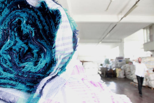Rolls of woven fabric in the mill