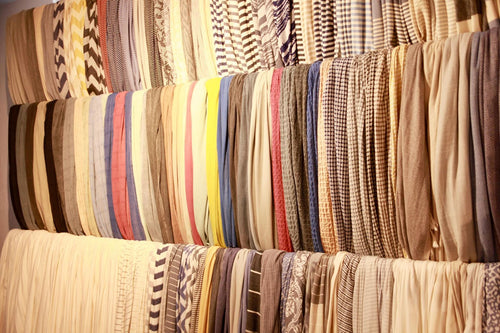 Shelves of folded striped Turkish towels