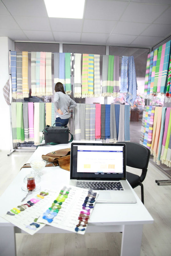 Designing new colorways on the laptop at the factory